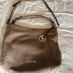 Michael kors leather handbag in Beige